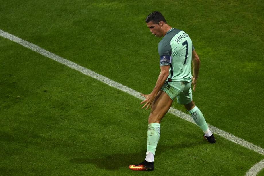Cristiano Ronaldo y su ya famosa forma de celebrar. / AFP