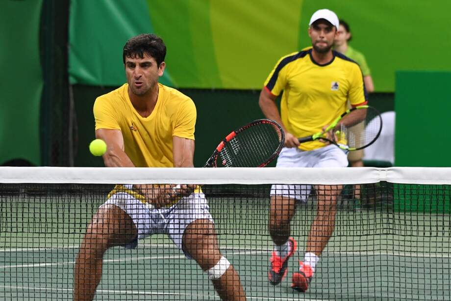 Los colombianos Robert Farah y Juan Sebastián Cabal se clasificaron a la segunda ronda. / AFP