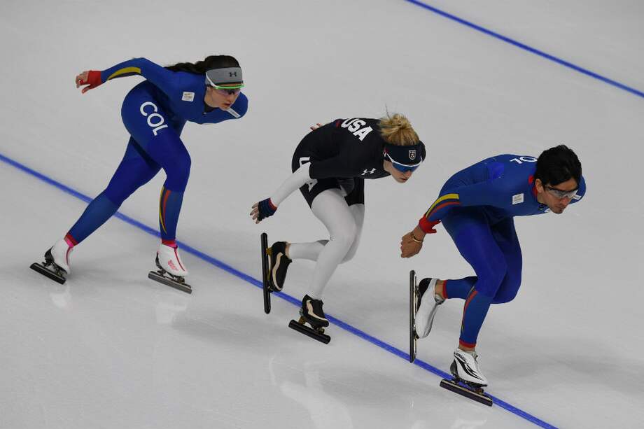 Laura Gómez entrena junto a Pedro Causil previo a los Juegos Olímpicos de Invierno. / AFP
