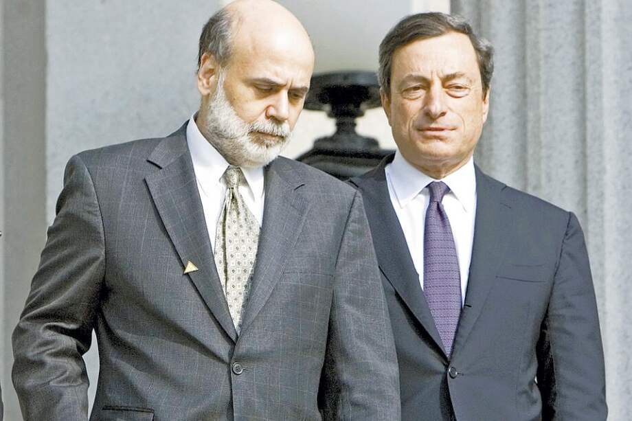 Ben Bernanke, de la FED y Mario Draghi, del Banco Central Europeo. / Reuters