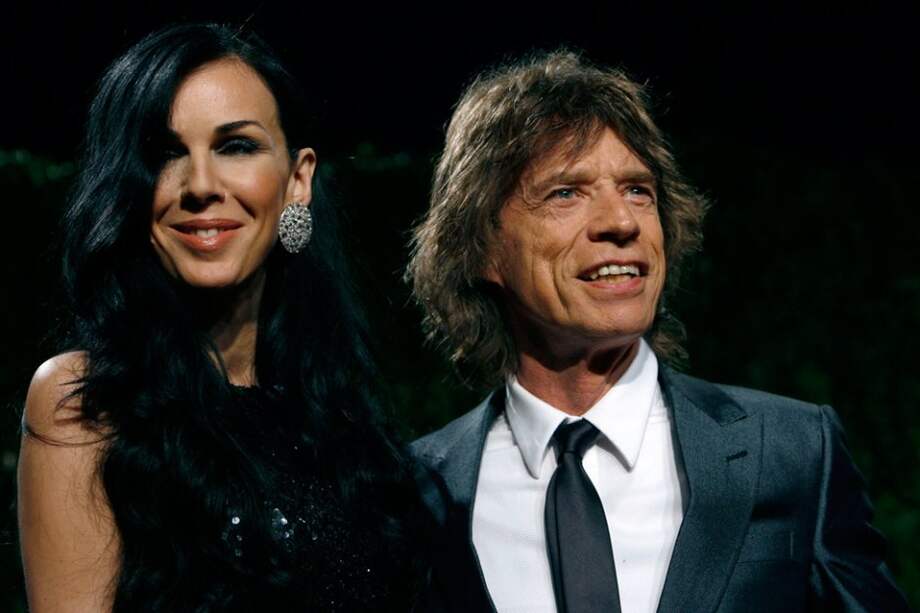 L'Wren Scott y Mick Jagger.