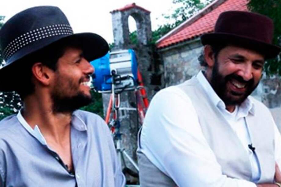 Draco y Juan Luis Guerra en el video de "Esto es Vida".