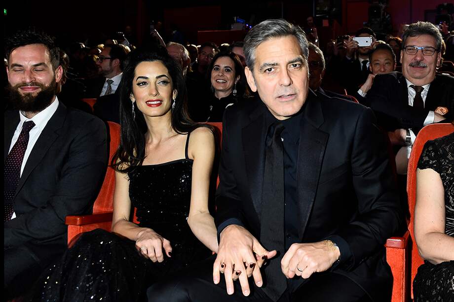Amal Alamuddin y George Clooney. / AFP