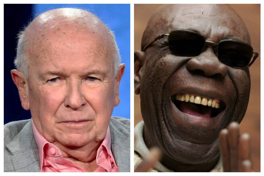 Los artistas Terrence McNally y Manu Dibango. / AFP