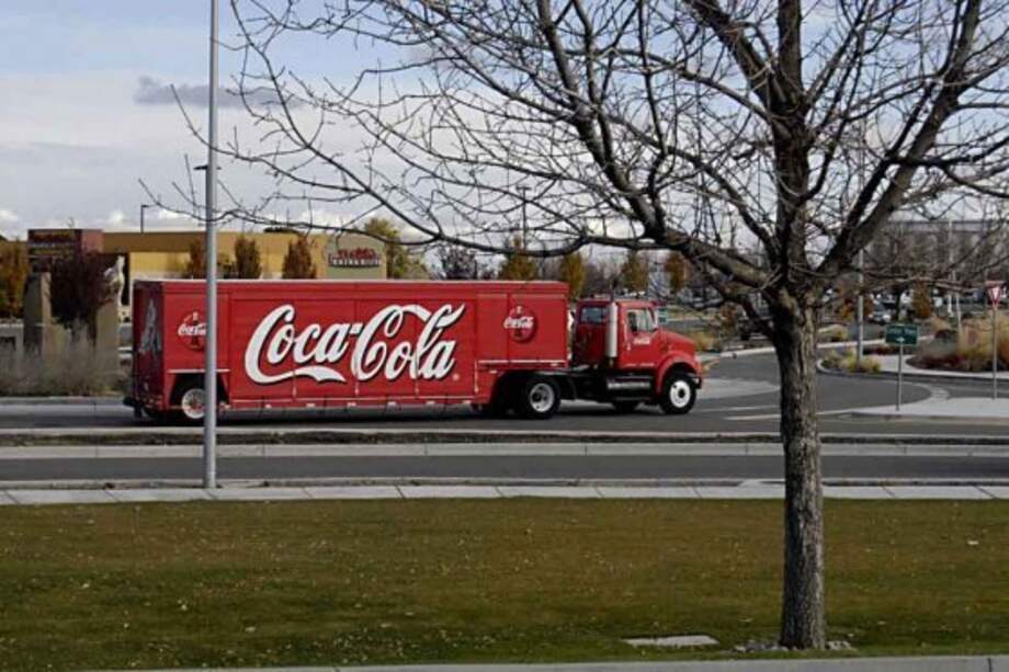Trabajadores de CocaCola en España protestan contra despidos