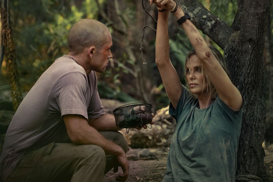 APEX. (L-R) Taron Egerton as Ben and Charlize Theron as Sasha in APEX. Cr. Kane Skennar/Netflix © 2026