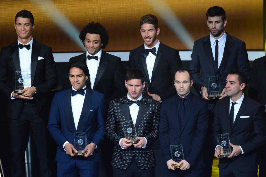 El Once Ideal: arriba de izq. a der.: Cristiano Ronaldo, Marcelo, Sergio Ramos, Piqué, Dani Álves e Íker Casillas. Abajo: Falcao, Messi, Iniesta, Xavi Hernández y Xabi Alonso. / AFP