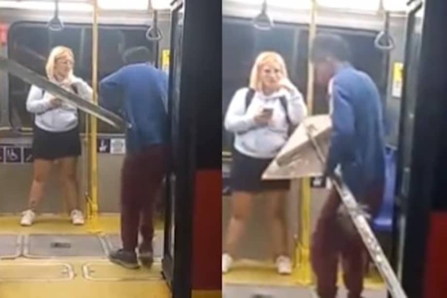 Sujeto intenta subir una señal a un bus de Transmilenio.