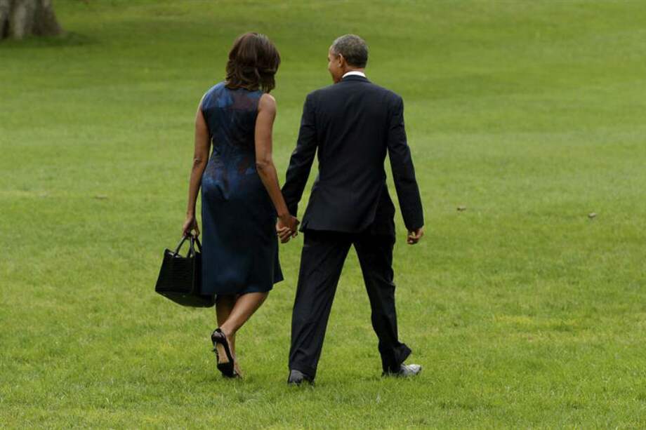 Obama dice que dejó de fumar por miedo a su mujer