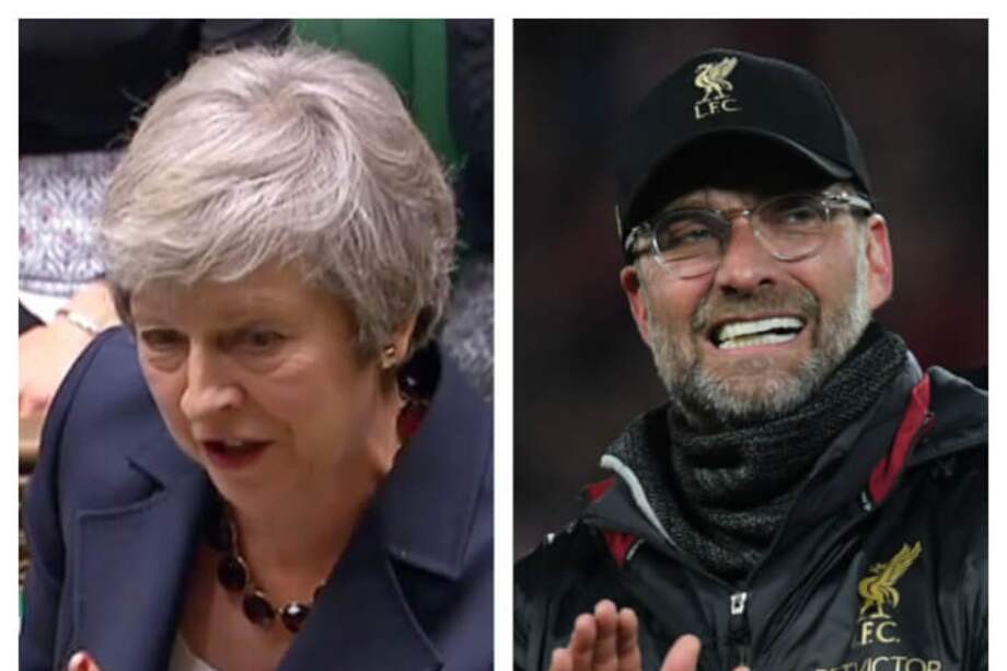 Theresa May, primera ministra británica, y Jürgen Klopp, técnico del Liverpool. / AFP
