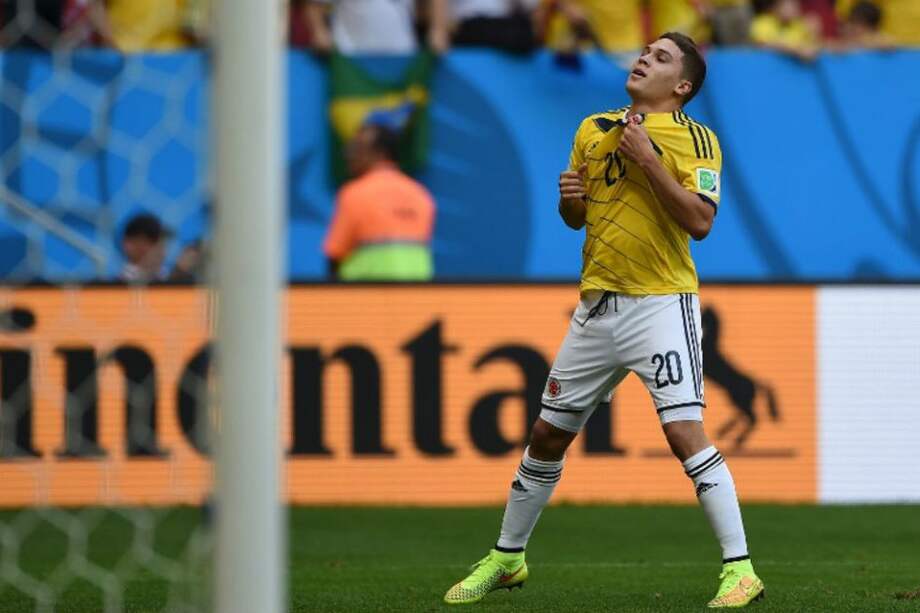 Juan Fernando Quintero celebra su gol contra Costa de Marfil en el Mundial de Brasil. Foto: AFP