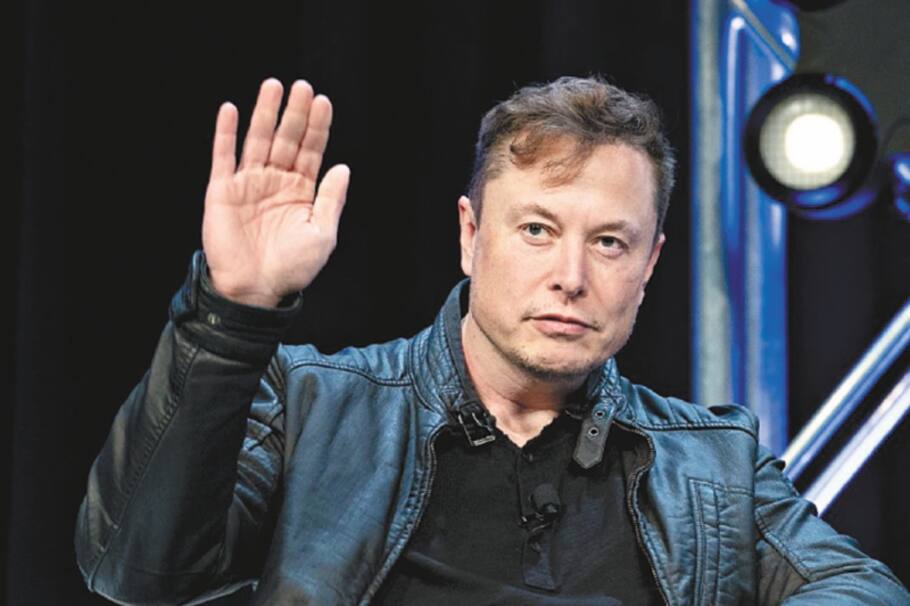 Elon Musk, founder of SpaceX and chief executive officer of Tesla Inc., waves while arriving to a discussion at the Satellite 2020 Conference in Washington, D.C., U.S., on Monday, March 9, 2020. The event comprises important topics facing both satellite industry and end-users, and brings together a diverse group of thought leaders to share their knowledge. Photographer: Andrew Harrer/Bloomberg