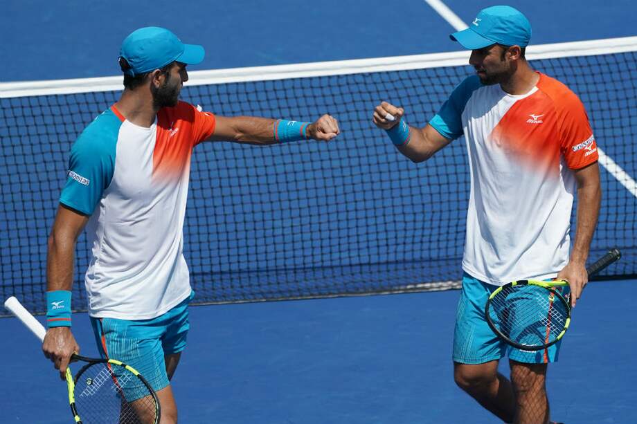 Juan Sebastián Cabal y Robert Farah ya aseguraron su tiquete al Torneo de Maestros. / AFP