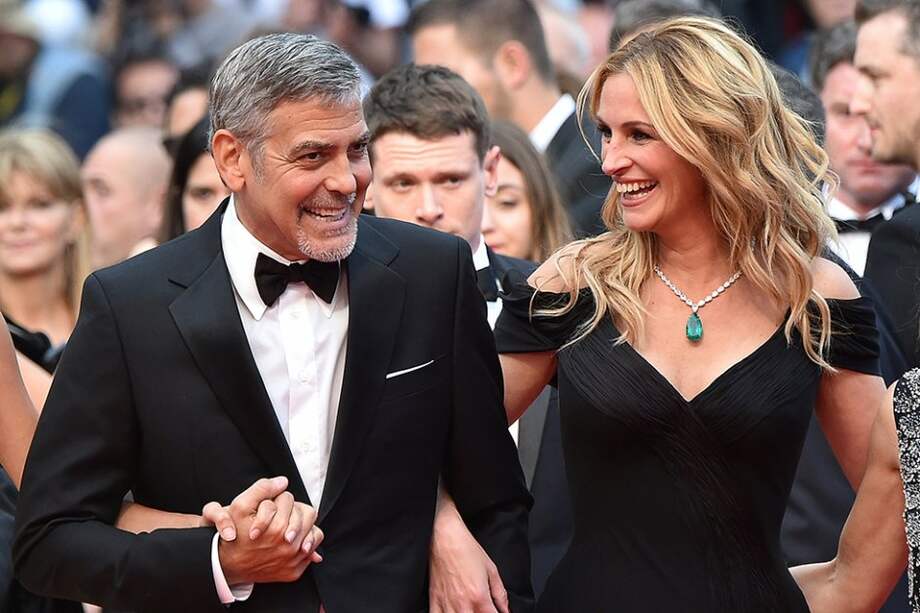 Los actores George Clooney y Julia Roberts. / AFP