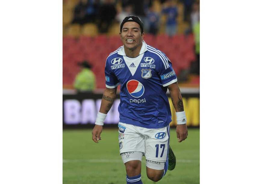 Dayro Moreno celebra el tanto que le dio la victoria a Millonarios sobre el Huila. / Gustavo Torres