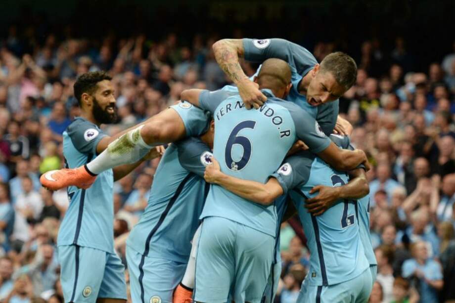 Los jugadores de Manchester City celebran uno de los goles con los que derrotaron al West Ham. / AFP