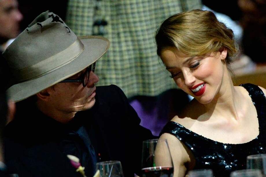 Johnny Depp y Amber Heard. / AFP