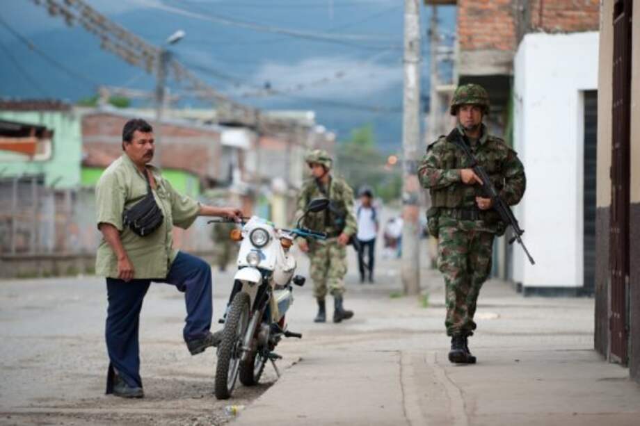 El Gobierno tiene que poder garantizar la vida de los activistas de derechos humanos si quiere hablar de paz. / Foto: AFP en Corinto, Cauca