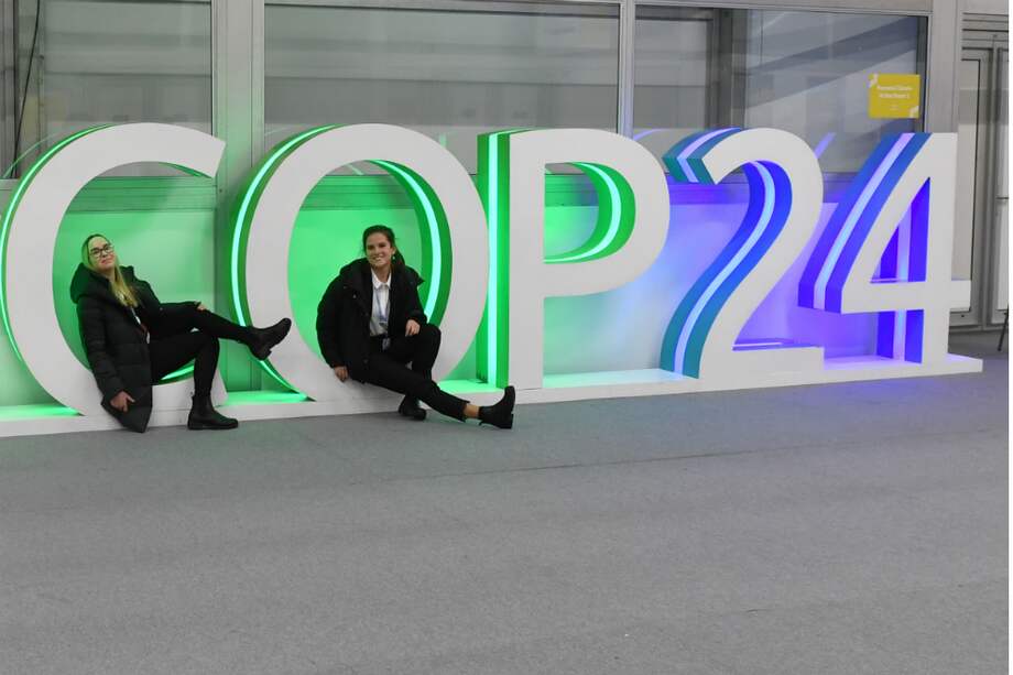 Turistas en el COP 24 que se realizó en Polonia. / AFP