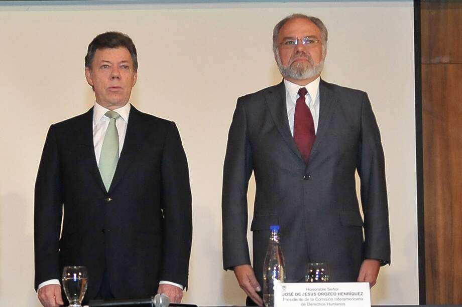 El presidente Juan Manuel Santos y el presidente de la Comisión Interamericana de Derechos Humanos, José de Jesús Orozco.