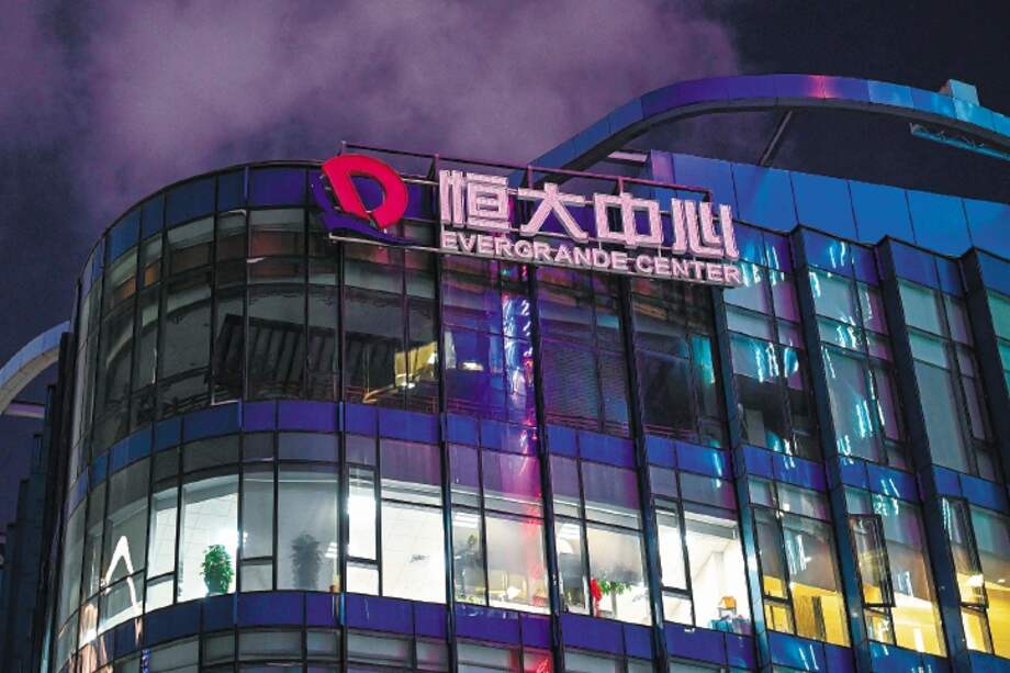 A general view shows the Evergrande Center building in Shanghai on October 9, 2021. (Photo by Hector RETAMAL / AFP)