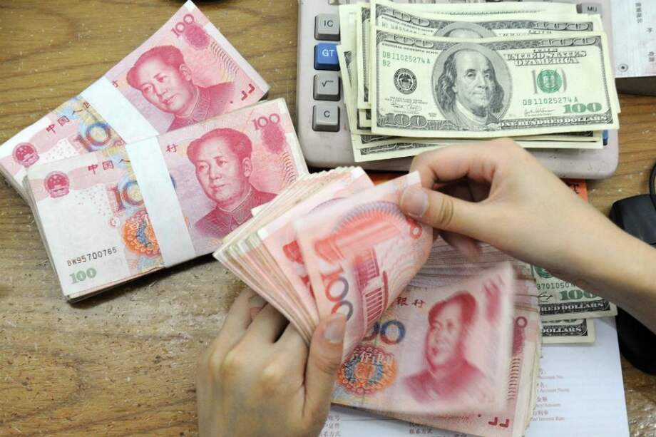 La caída de las reservas ilustra el costo que eso tiene para China. / AFP