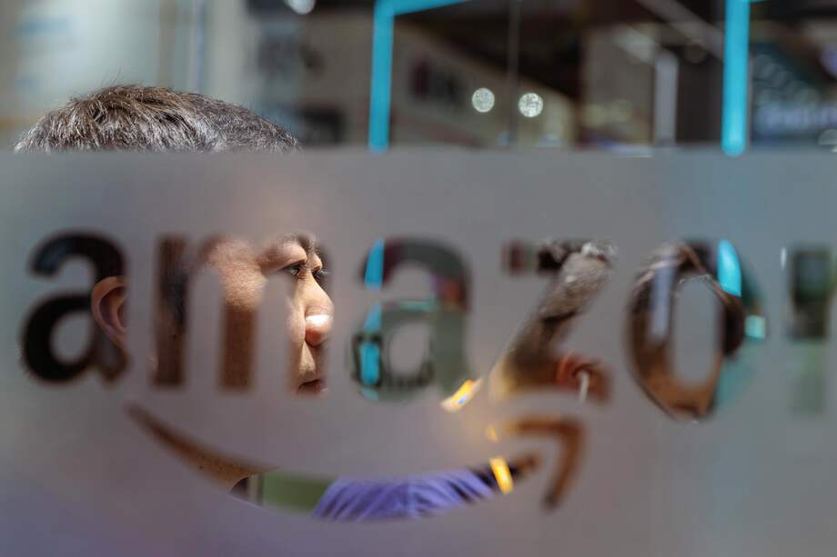Shanghai (China), 07/11/2022.- A man sits at the Amazon company booth during the China International Import Expo in Shanghai, China, 07 November 2022. The China International Import Expo (CIIE) will be held in Shanghai from 05 to 10 November 2022. EFE/EPA/ALEX PLAVEVSKI