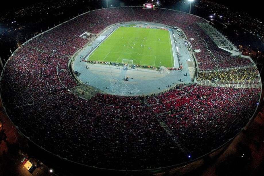 Vista aérea del Estadio Nacional en Santiago, Chile, durante un partido de la Selección Chilena durante las eliminatorias para el Mundial Brasil 2014. Foto: AFP