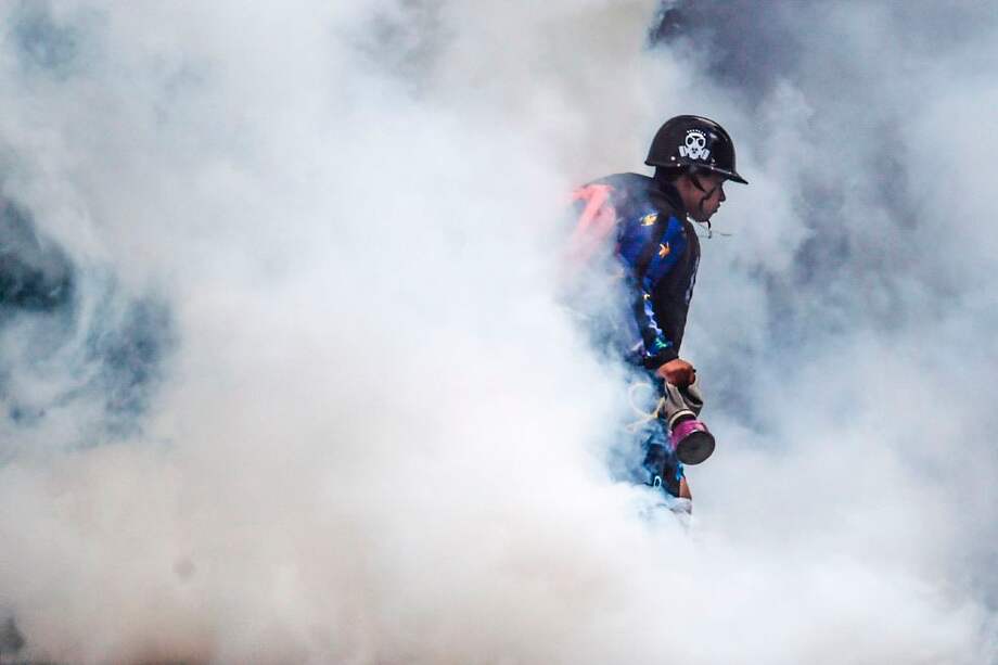 Las marchas ya dejan 57 muertos en Venezuela. / AFP