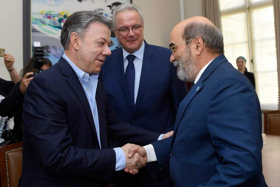 Santos (izquierda), Neven Mimica (centro) y José Graziano da Silva (derecha). / Presidencia