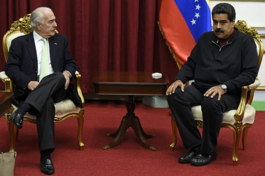 El expresidente Pastrana se reúne con el mandatario de Venezuela, Nicolás Maduro. / AFP