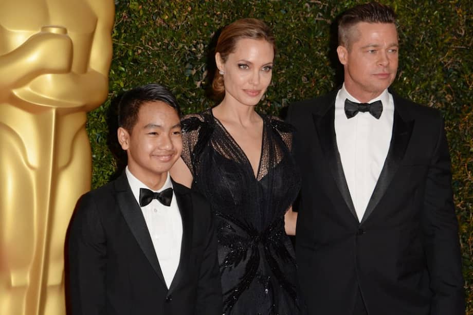 Angelina Jolie y Brad Pitt con Maddox. / AFP