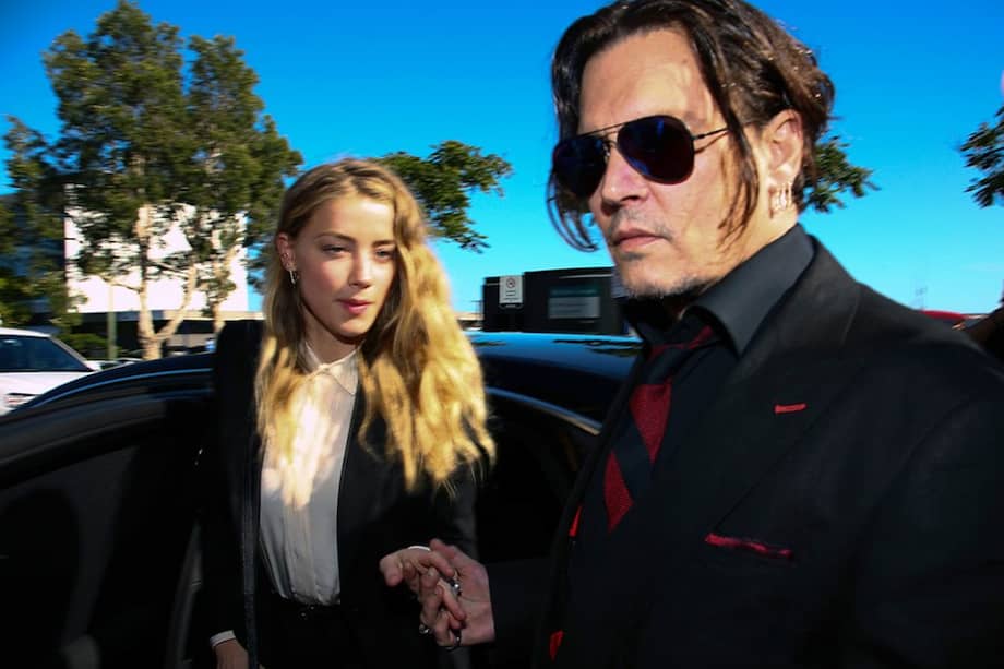 El actor estadounidense Johnny Depp y su esposa, Amber Head, en los juzgados de Southport (Australia). / AFP