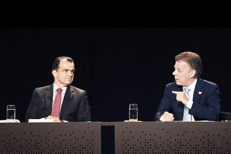 Los candidatos Óscar Iván Zuluaga y Juan Manuel Santos en debate. / Andrés Torres