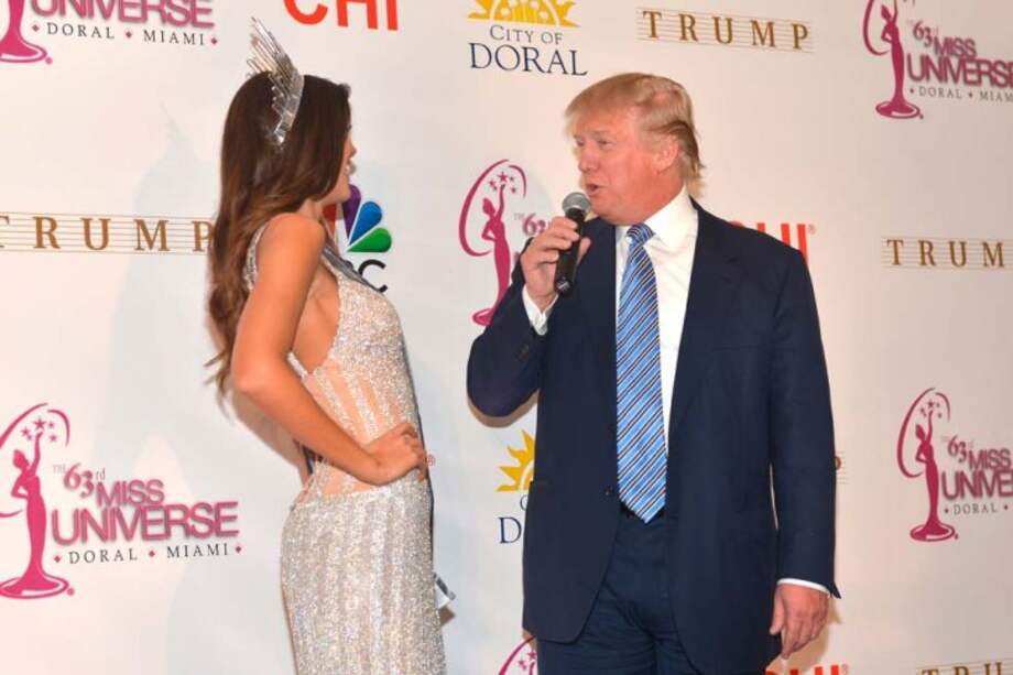 Paulina Vega y Donald Trump. / AFP