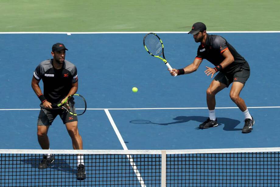 Los tenistas colombianos son segundos en la carrera de dobles en este 2018, con 5.290 puntos . / AFP