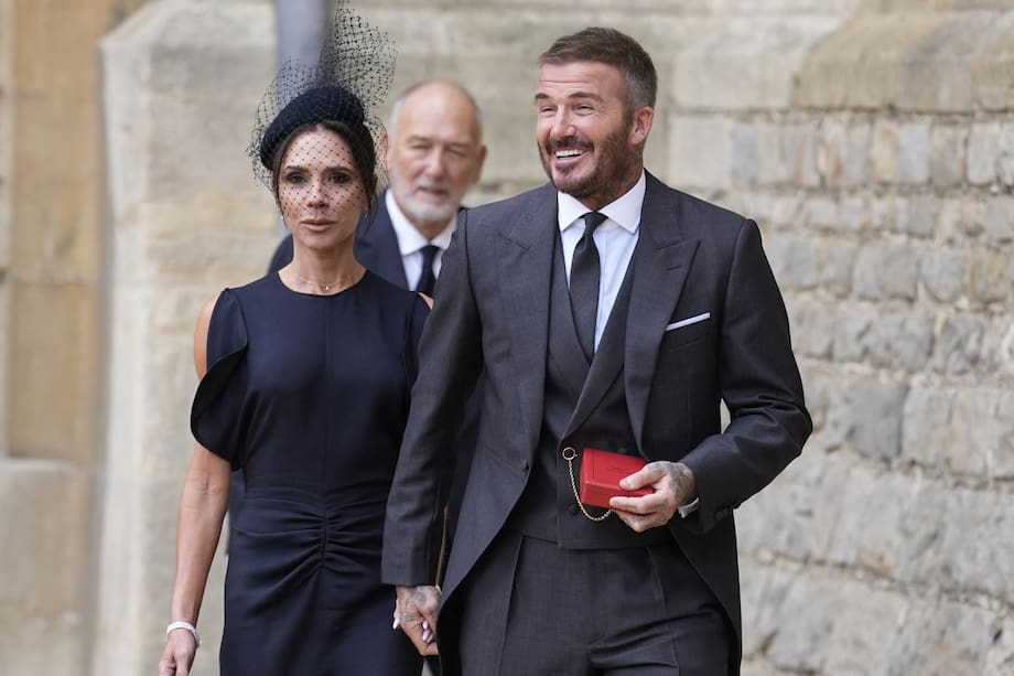 Victoria y David Beckham. (Photo by Andrew Matthews / POOL / AFP).
