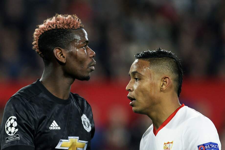 Muriel (dere.) y el francés Paul Pogba durante el encuentro de este miércoles. / AFP