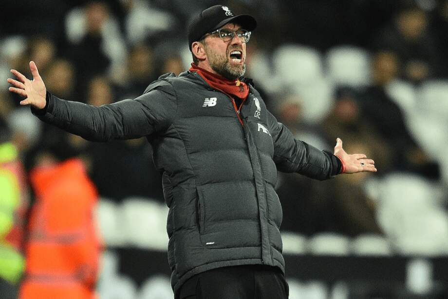 El entrenador alemán Jurgen Klopp durante el juego ante el West Ham United este miércoles. Su Liverpool hace historia. / Glyn Kirk / AFP