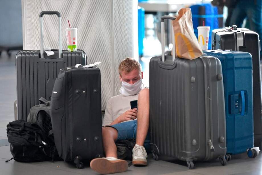 Muchos extranjeros se quedaron varados en Colombia por cuenta de la crisis mundial por coronavirus. / AFP