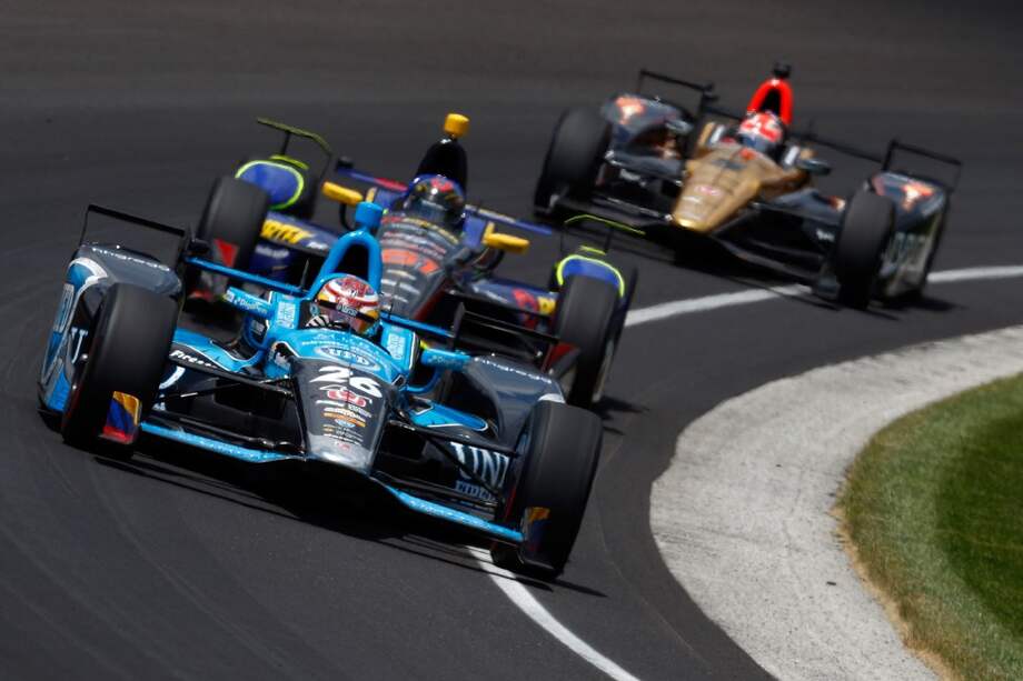El piloto Carlos Muñoz, ayer, en las 500 Millas de Indianápolis. / AFP