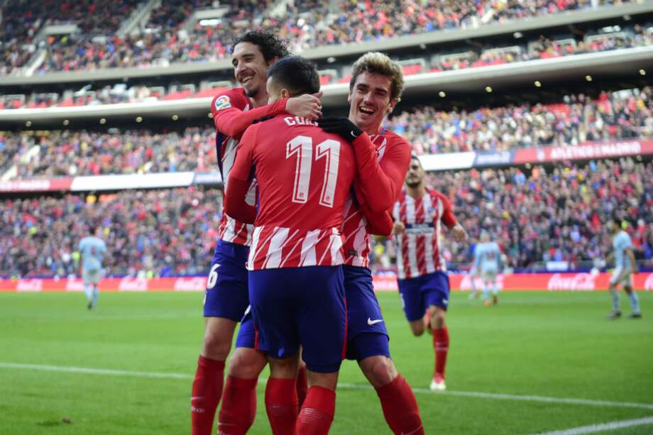 El cuadro colchonero sumó su victoria 19 en el torneo local. / AFP