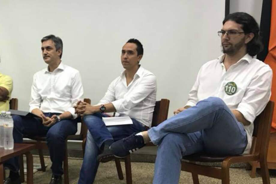 Christian Garcés (izq.), candidato del Centro Democrático, y Eli Shnaider (der.), candidato de la Alianza Verde.