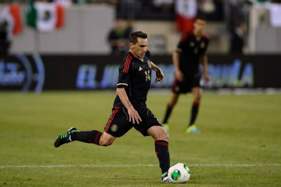 Christian Giménez es actual delantero del Cruz Azul de México. / AFP