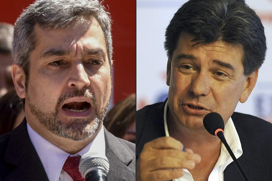 Mario Abdo Benítez y Efraín Alegre. / AFP