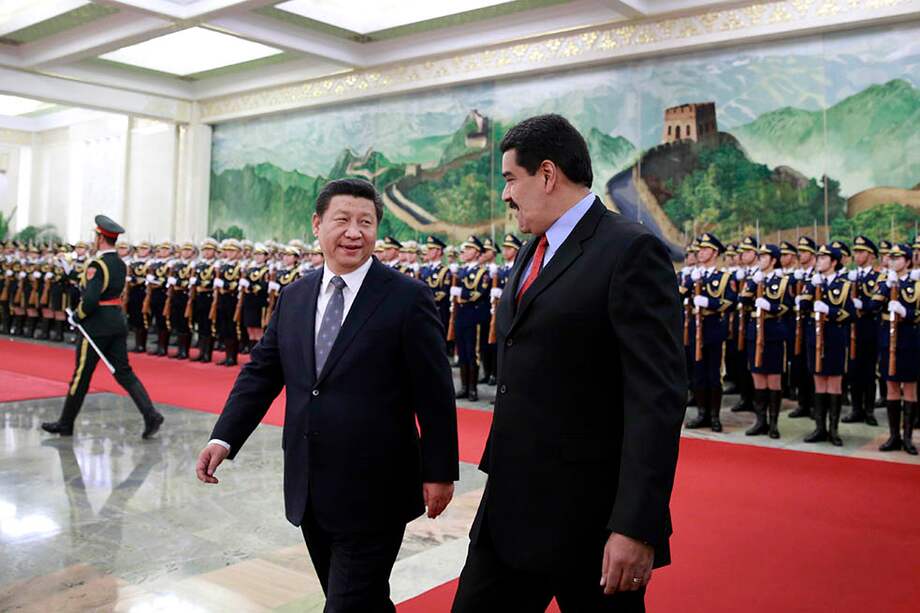 En enero de este año el presidente chino, Xi Jinping, recibió a su homólogo venezolano, Nicolás Maduro. / AFP