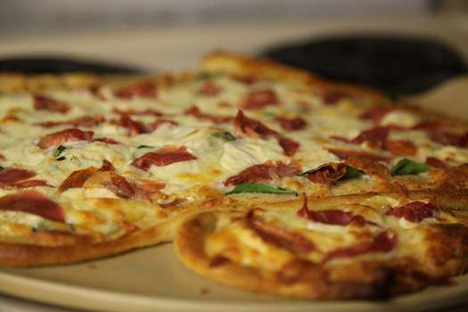 La pizza congelada es uno de los alimentos que contiene grasas trans. / Flickr