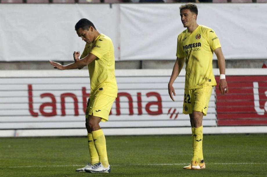 El delantero colombiano Carlos Bacca (Izq.) abrió el marcador en la victoria del Villarreal sobre el Zamora. Llegó a 39 anotaciones con el submarino amarillo.
