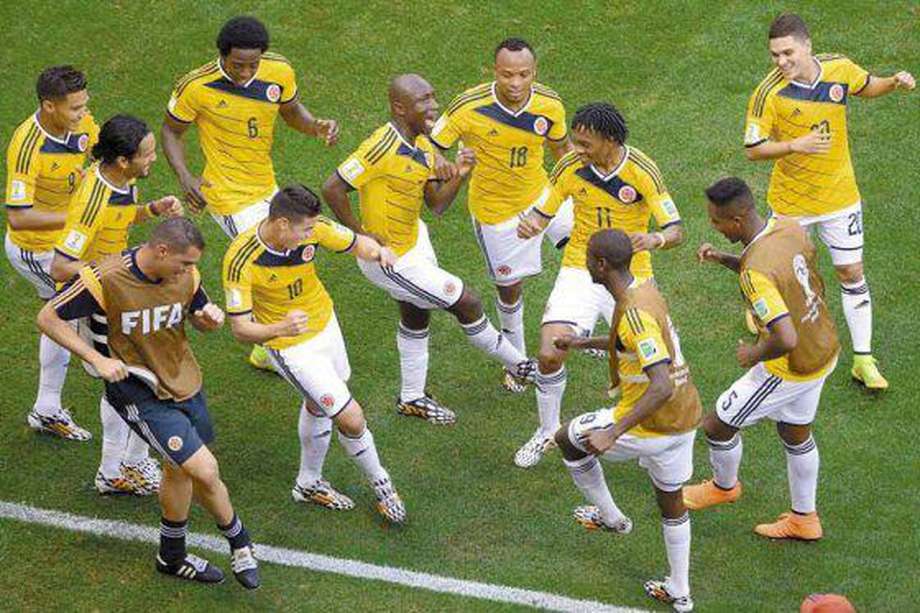 Los jugadores de la selección de Colombia se robaron el show en el Mundial de Brasil, con su celebración al ritmo del ras tas tas. / Archivo AFP