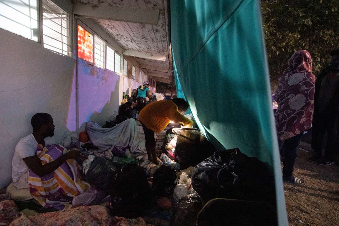 Haitian migrants are seen at a shelter in Ciudad Acuna, Coahuila state, Mexico, on September 23, 2021. - Tens of thousands of migrants, many of them Haitians previously living in South America, have arrived in recent weeks in Mexico hoping to enter the United States. (Photo by PEDRO PARDO / AFP)